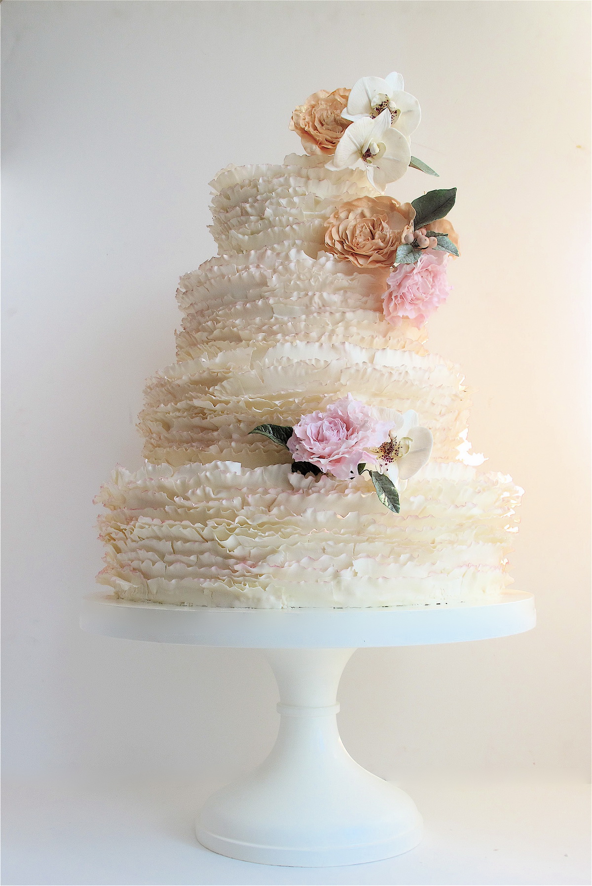 ivory frills with peonies and orchids  - Maggie Austin Cake